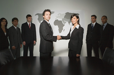 Business meeting; principles shaking hands