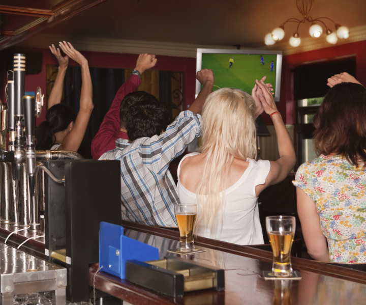 People watching the match in a pub